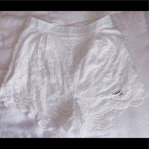 White embroidered high-waisted shorts